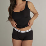 Panty cachetero unicolor en algodón Diane & Geordi – vista frontal- color negro