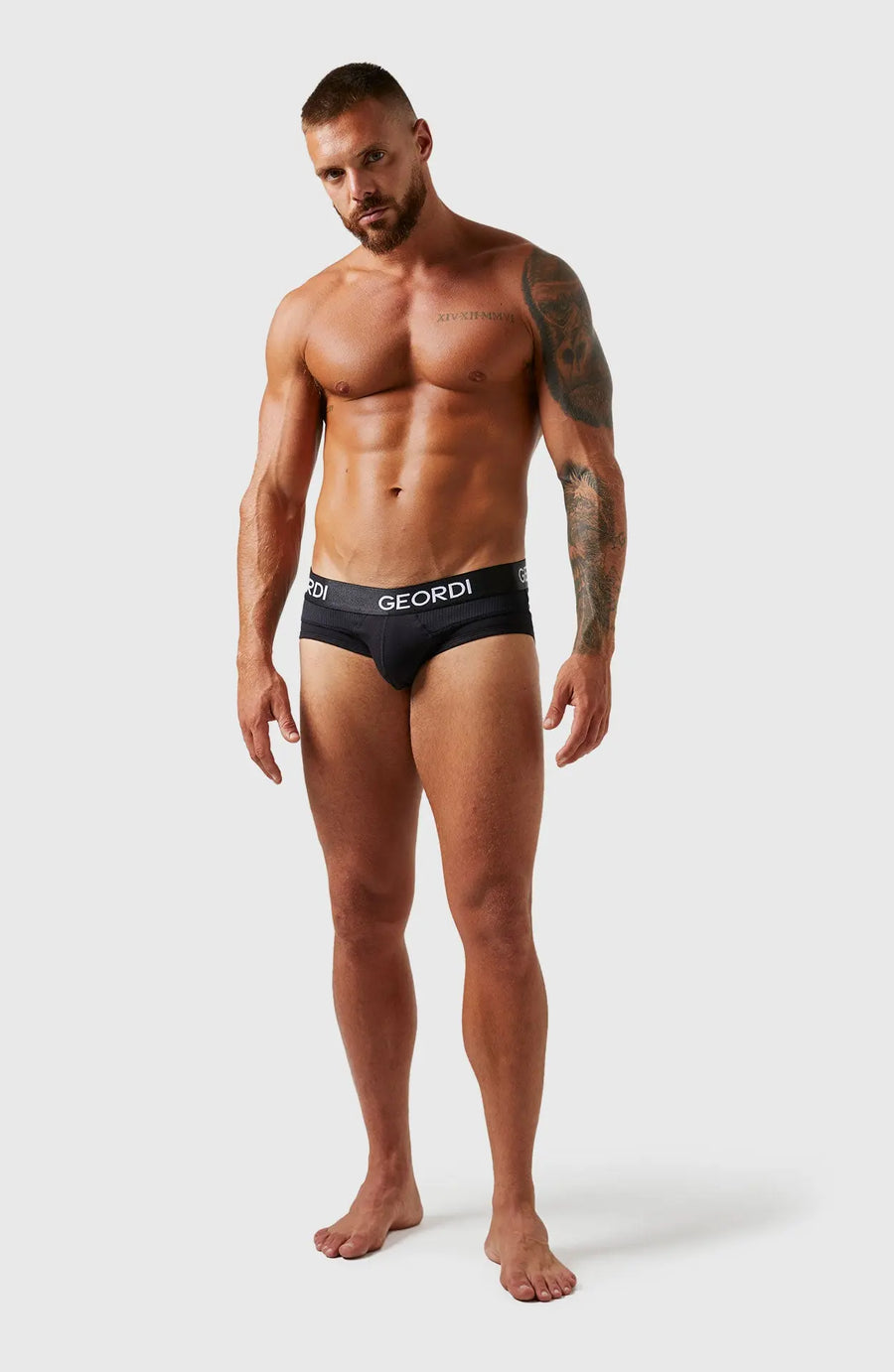 Brief masculino en algodón peinado con elástico contramarcado. Color negro