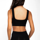 Panty bóxer seamless unicolor con control suave y cobertura extendida – Diane & Geordi, color negro de espalda