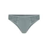 Panty tanga unicolor con laterales en encaje Diane & Geordi, color verde fondo transparente
