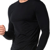 Camiseta manga larga ajustada para hombre en microfibra premium. Color negro